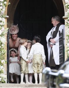Pippa Middleton wedding Duchess of Cambridge (in Alexander McQueen) stands with Princess Charlotte.