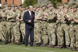 Prince Philip, in his capacity of Colonel, Grenadier Guards, chats with members of the 1st Battalion Grenadier Guards as they applaud the final whistle from the sidelines, of the Manchester Cup inter-company football match at Lille BarracksManchester Cup inter-company football match, Lille Barracks, Aldershot, UK - 30 Mar 2017The Duke of Edinburgh on Thursday presented the Manchester Trophy to the winners of the Manchester Cup, met Sergeants' in their Mess and stayed for lunch in the Officers' Mess