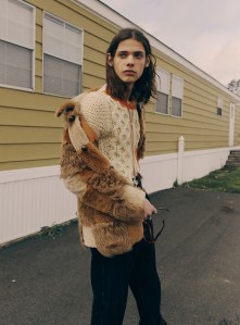 Marni’s virgin wool and leather jacket, Maison Margiela’s spray-painted wool sweater and Maiden Noir’s cotton pants. Gucci glasses and rings.