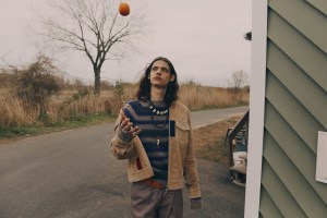 Soulland’s suede jacket, Boglioli’s wool sweater and Andrea Pompilio’s cotton and wool pants. Prada Belt; Pascale Monvoisin necklace; Gucci rings.