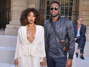 Gabrielle Union and Dwyane Wade front row at Berluti