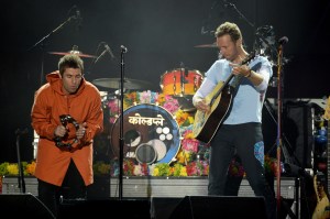 Hand out image - Free of charge for editorial use onlyMandatory Credit: Photo by SilverHub/REX/Shutterstock (8857718bo)Liam Gallagher, Chris MartinOne Love Manchester Concert, Old Trafford Cricket Ground, Manchester, UK - 04 Jun 2017