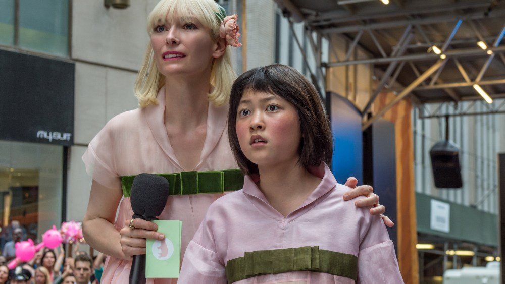 Tilda Swinton as Lucy Mirando and An Seo Hyun as Mija in OKJA.
