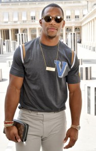 Victor Cruz front row at Louis Vuitton