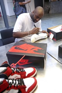 Virgil Abloh signing Nike trainers