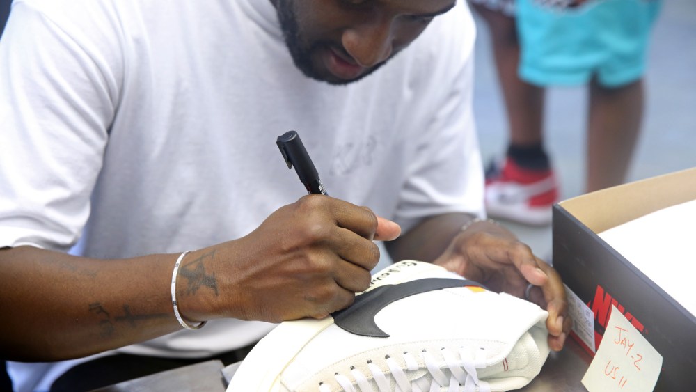 Virgil Abloh signing Nike trainers