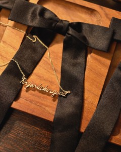 A "finger-lickin' good necklace" and Colonel Sanders-esque bowtie.