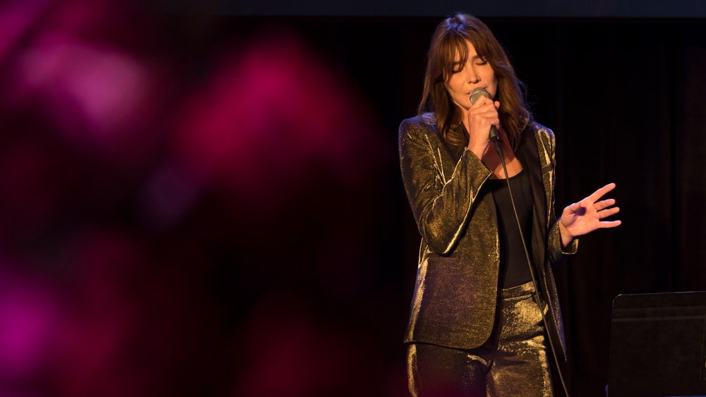 Carla Bruni performing at Amfar