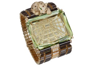 Panthere Narcisse bracelet where the panther looks at the infinity in the huge green beryl of 167.64 carats.