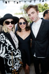 Jennifer Lawrence, Natalie Portman and Robert Pattinson front row at Christian Dior