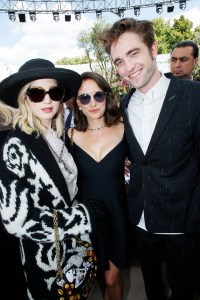 Jennifer Lawrence, Natalie Portman and Robert Pattinson front row at Christian Dior