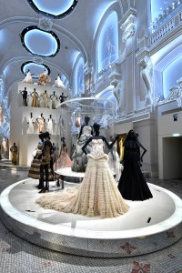 Gowns by John Galliano and Maria Grazia Chiuri in the Dior exhibition at Les Arts Décoratifs. In the center, Christian Dior’s Junon dress.