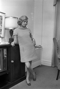 Jeanne Moreau in cowl-neck minidress