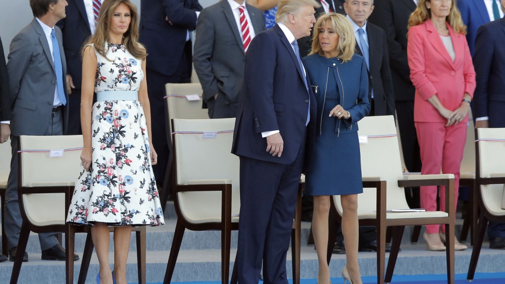 Brigitte Macron, wife of French President Emmanuel Macron, discusses with U.S. President Donald Trump while U.S. First Lady Melanie Trump looks, prior to the traditional Bastille Day military parade on the Champs Elysees, in ParisBastille Day, Paris, France - 14 Jul 2017