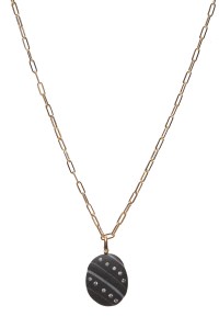 A piece from the Man Repeller collaboration with CVC Stones