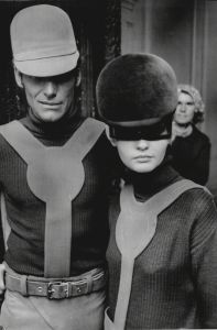 Hat Fashions By Cardin; The Man In Scaffolder's Crash-helmet The Girl In Space Helmet. Hat Fashions By Cardin; The Man In Scaffolder's Crash-helmet The Girl In Space Helmet.