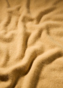 Vince will launch cashmere blankets and pillows.