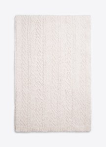 Vince will launch cashmere blankets and pillows.