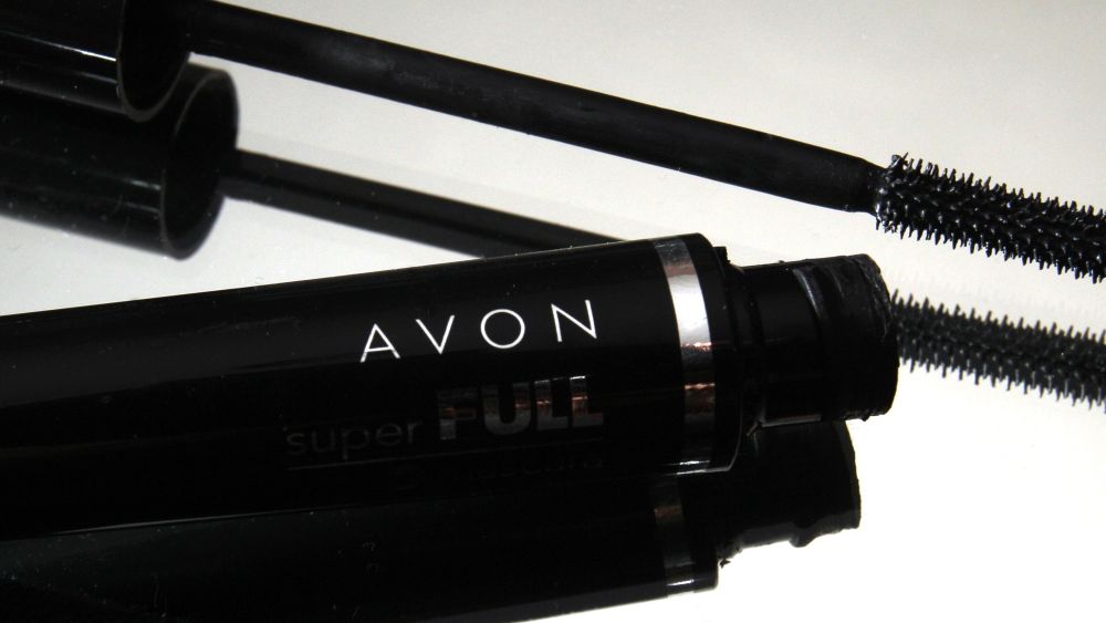 A container and brush of Super Full mascara by Avon sits on display in North Andover, Mass. Direct beauty products seller Avon Products said its third-quarter net income fell 81 percent, hurt by the stronger dollar and an impairment charge. The company also slashed its dividendEarns Avon, North Andover, USA