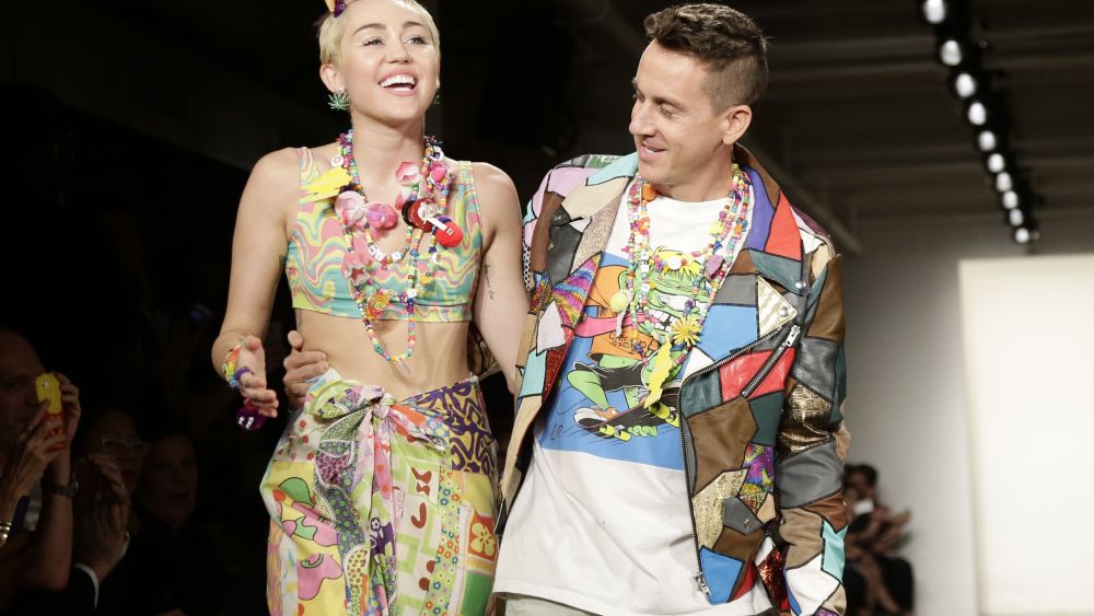 Us Singer Miley Cyrus (l) Walks on the Runway with Us Designer Jeremy Scott (r) at the Conclusion of His Spring 2015 Collection During Mercedes-benz Fashion Week in New York New York Usa 10 September 2014 the Spring 2015 Collections Are Presented From 04 to 11 September United States New YorkUsa New York Fashion Week - Sep 2014
