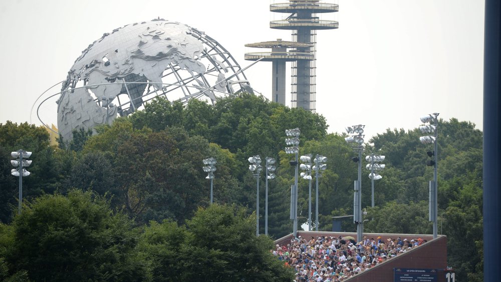 Fans Watch Play on an Outer Court with the Unisphere in the Background on the First Day of the 2015 Us Open Tennis Championship at the Usta National Tennis Center in Flushing Meadows New York Usa 31 August 2015 the Us Open Runs Through 13 September Which is a Return to a 14-day Schedule United States Flushing MeadowsUsa Tennis Us Open Grand Slam 2014 - Aug 2015