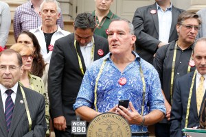 Garment Center Steering Committee supporters speak out on the steps of City Hall.
