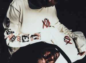 A look from The Weekend's  #003 Merch Collection.