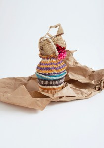 Carrie Forbes' sandal, Nannacay's straw bag and Sensi Studio's bags. (colored baskets)