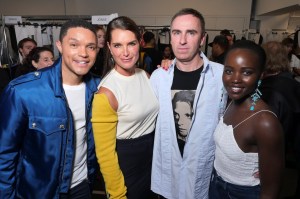 Trevor Noah, Brooke Shields, Raf Simons and Lupita Nyong'o in the Front Row at Calvin Klein 205W39NYC RTW Spring 2018