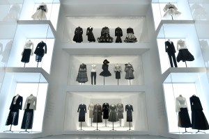 Vintage Dior designs sit alongside outfits by contemporary brands like Thom Browne, Comme des Garçons and Givenchy in the Dior exhibition at Les Arts Décoratifs.