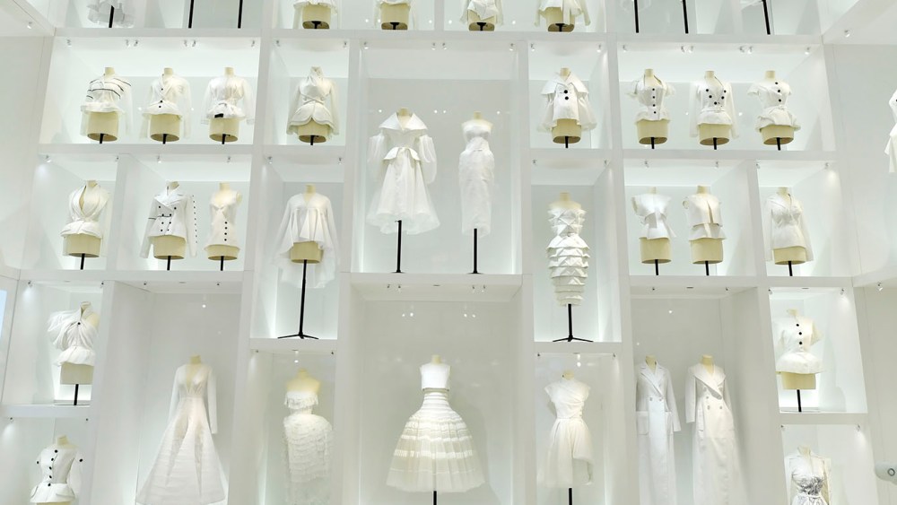 A room full of toiles evokes the haute couture atelier in the Dior exhibition at Les Arts Décoratifs.