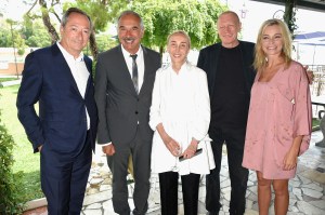 VENICE, ITALY - SEPTEMBER 01:  (L-R) Stefano Sassi, Carlo Capasa, Carla Sozzani, a guest and Stefania Rocca Felice attend an intimate lunch hosted by Livia Firth, Carlo Capasa and Caroline Scheufele to announce Chopard as partner for The Green Carpet Fashion Awards at Hotel Cipriani on September 1, 2017 in Venice, Italy.  (Photo by David M. Benett/Getty Images for Eco-Age)