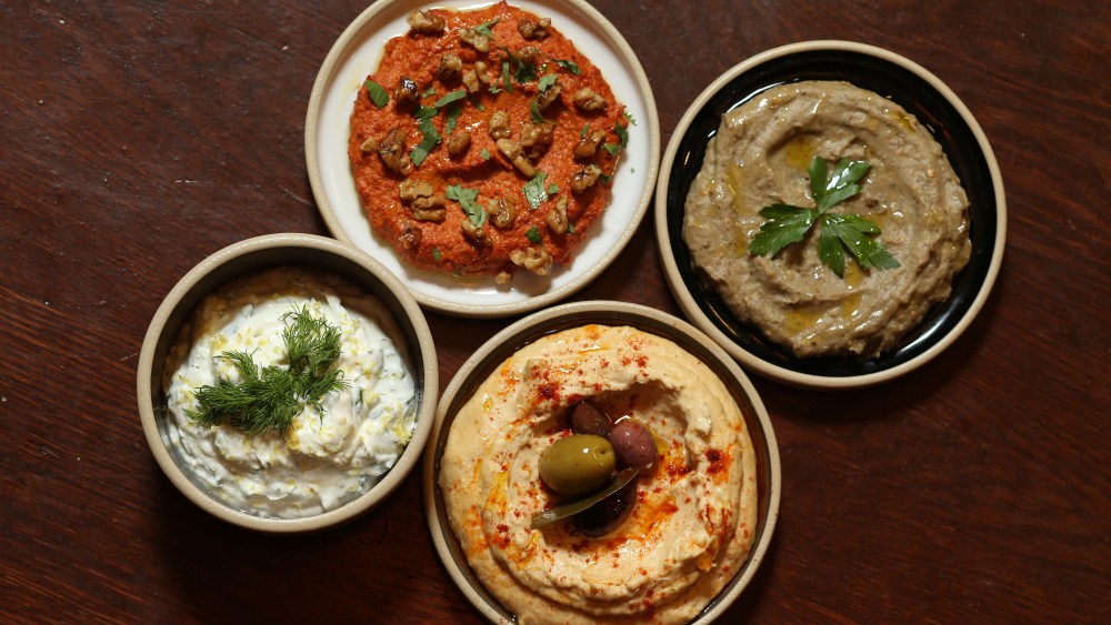 Muhammara, Baba Ganoush, Labneh, and Fermented Miso Hummus.