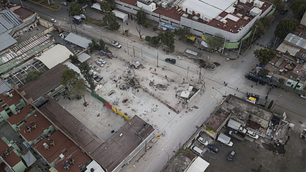 The quake-collapsed textile factory building leaves an empty space at the corner of Bolivar and Chimalpopoca streets after the rubble was cleared away in the Obrera neighborhood of Mexico City, . As rescue operations stretched into day 5, residents throughout the capital have held out hope that dozens still missing might be found aliveEarthquake, Mexico City, Mexico - 23 Sep 2017