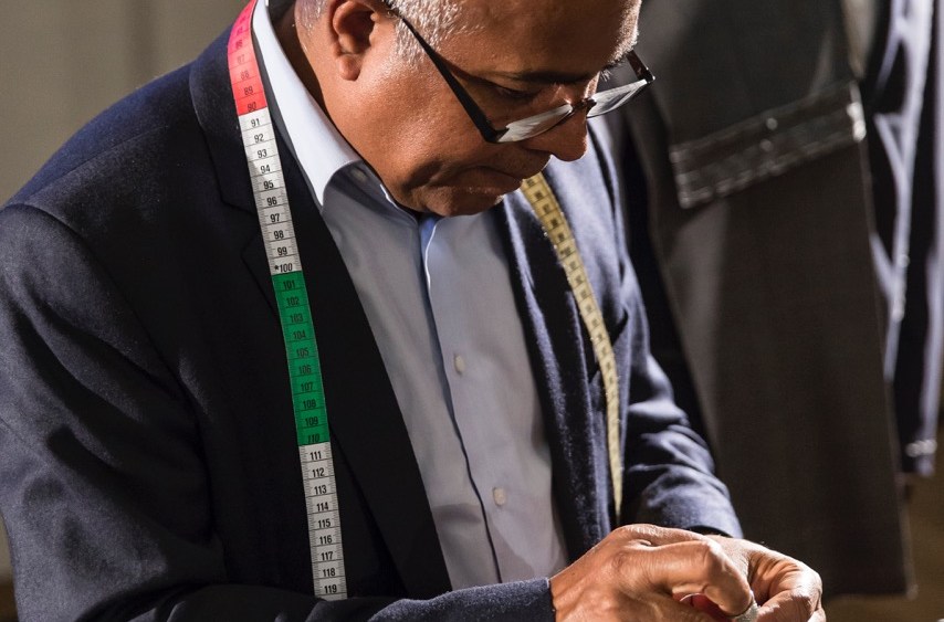 A Scabal tailor at work.