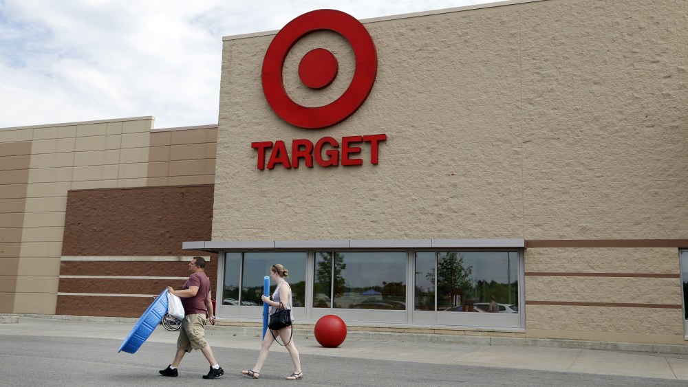 Customers walk with their purchases from a Target store, in Methuen, Mass. Target Corp. reports earnings, Wednesday, Aug. 16, 2017Earns Target, Methuen, USA - 27 Jun 2016