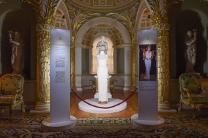 A dress worn by Diana, Princess of Wales, to a gala in Washington in 1996, alongside handwritten notes to the house, from Catherine Walker and Co.'s 40th anniversary exhibition at Spencer House