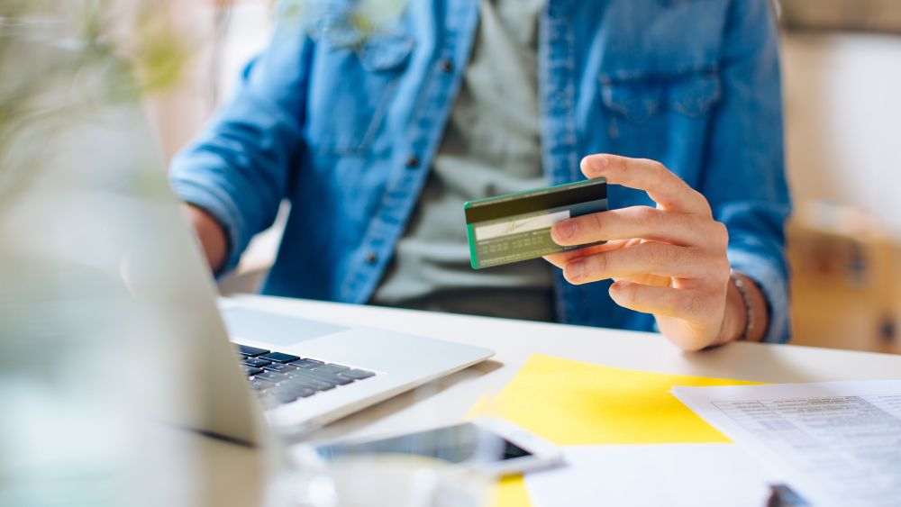 Online spending is expected to surpass in-store shopping this holiday, according to a Deloitte survey.