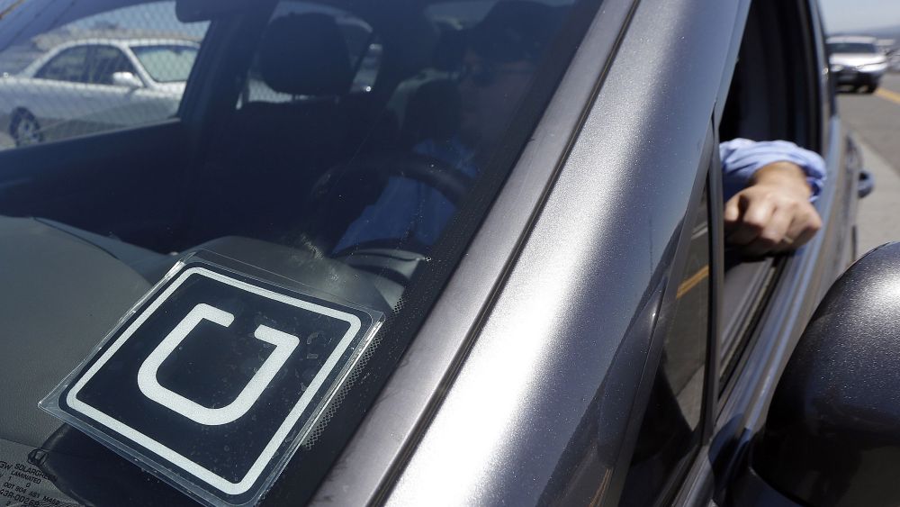 Uber Uber driver Karim Amrani sits in his car parked near the San Francisco International Airport parking area. Uber said, it will pay at least $10 million to settle a case in which California prosecutors alleged it misled passengers over the quality of its driver background checksUber-Safety, San Francisco, USA