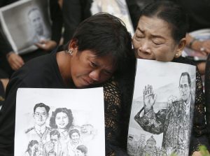 Throngs of people gathered to mourn the one year anniversary of the monarch's passing.
