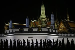 Thai officials walk past the Grand Palace in a rehearsal for the funeral pyre of the late Thai King Bhumibol Adulyadej.