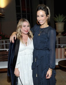 WEST HOLLYWOOD, CA - NOVEMBER 16:  Emily Current (L) and Meritt Elliott at Zimmermann Los Angeles Dinner at Sunset Tower on November 16, 2017 in West Hollywood, California.  (Photo by Donato Sardella/Getty Images)