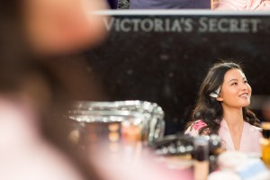 Xin Xie backstage during hair and make-up at the Victoria's Secret show