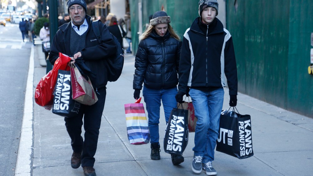 Holiday shoppers coming from Uniqlo.