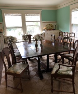 Dining room with original antique refectory table and original Berkey & Gay chairs.