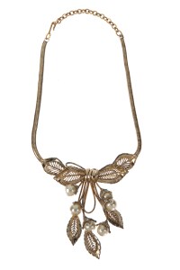 A snake chain necklace suspending simulated pearl and diamond foliate centerpiece with tremblers.  Worn by Ginger Rogers in "Dream Boat" (20th Century Fox, 1952).