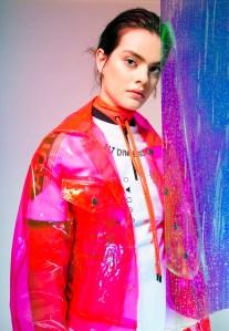 DKNY Sport’s polyester and spandex top under Adidas Originals by Alexander Wang’s polyester and elastane top and onesie; Brashy Studios’ PVC jacket.