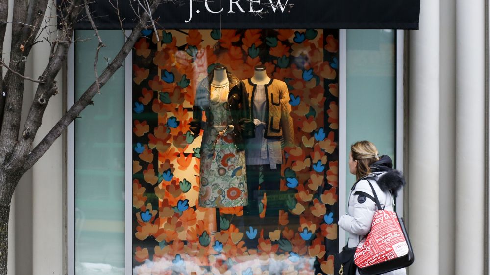 Hold for Swayne Hall Business Photo-A shopper passes the display in the window of a J.Crew store in the Shadyside shopping district of PittsburghConsumer Spending, Pittsburgh, USA - 10 Feb 2017