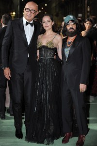 Dakota Johnson, Marco Bizzarri and Alessandro MicheleGreen Carpet Fashion Awards Italia, 24 Sep 2017