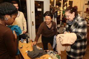 Jussara Lee held a holiday mending party to encourage sustainability.
